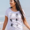 Model wearing a light grey T-shirt featuring 6 bees