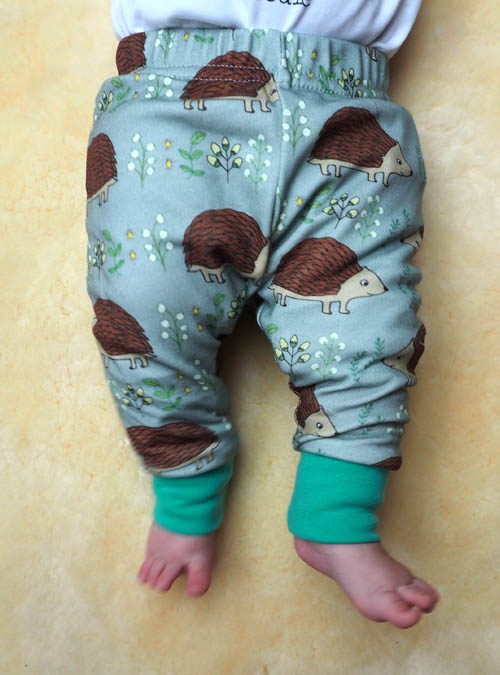 Photograph of babies legs showing cute hedgehog leggings