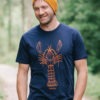 Model wearing organic lobster T-shirt, Orange lobster on a navy T-shirt