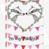 valentines birthday card featuring 2 badgers in love with the text "be my badger" underneath. With a backround if bunting