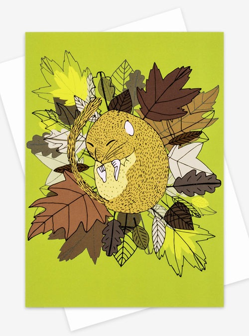 Photo of a Dormouse card featuring an illustration of a Dormouse hibernating on autumn leaves