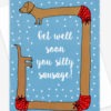 Get well soon card featuring a broken sausage dog wrapped around the card with text in the middle 'Get well soon you silly sausage'