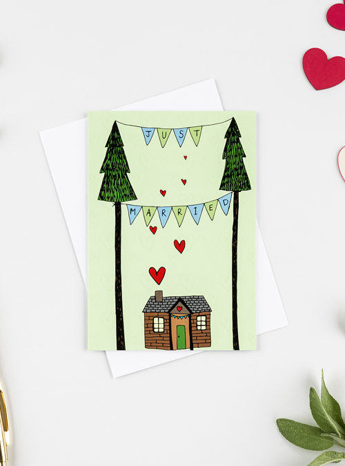 lllustration of a wooden love shack with bunting above saying 'Just married'