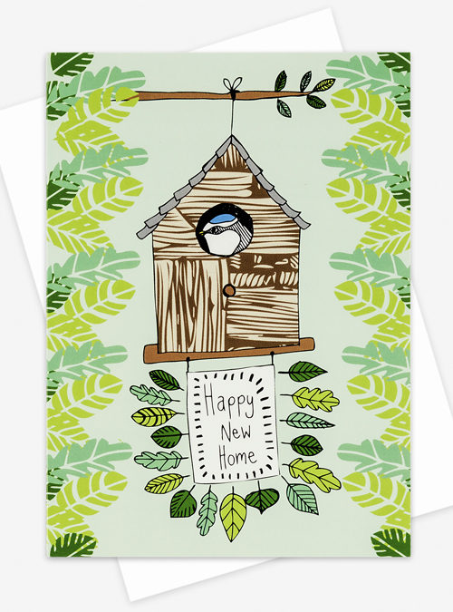 Happy new home card featuring a blue tit nesteled into their new bird house with the text 'Happy new home' underneath