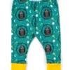photo of owl baby leggings featuring a repeat pattern of owls on a teal background with yellow cuffs