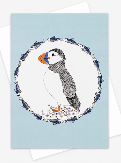 Puffin greetings card featuring an illustration of a puffin surrounded by herrings