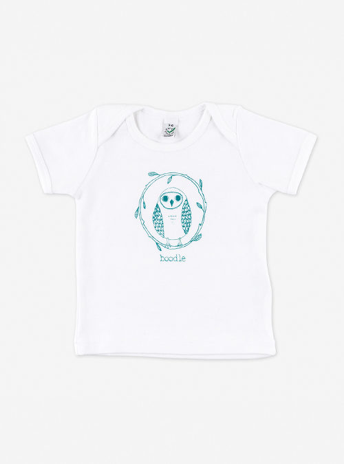 photo of an owl baby T-shirt featuring an owl perched on a branch. printed in teal ink