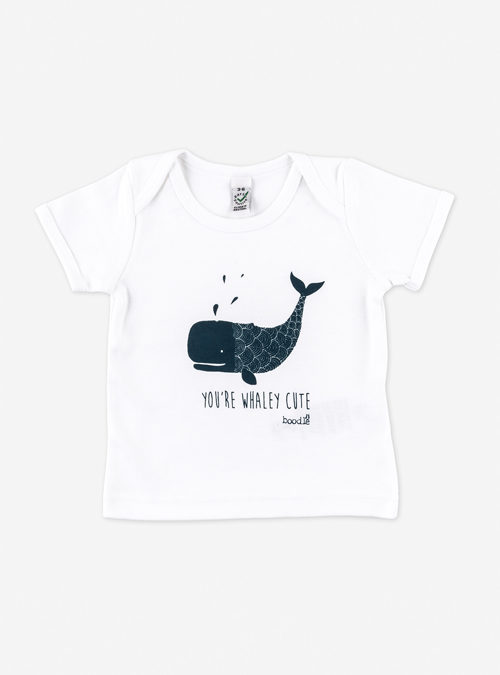 White baby T-shirt featuring a dark navy print of a whale with the wording 'You're whaley cute' underneath. Organic cotton
