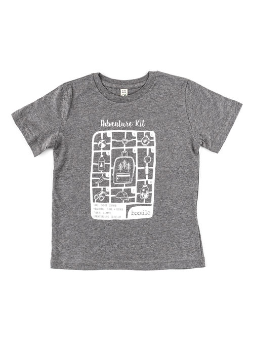 Grey kids t-shirt with a white print of an airfix adventure kit with all that you need for an adventure.