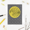 Greetings card featuring a yellow circle with an illustration of a pangolin. Black ink illustration of a pangolin curled up.