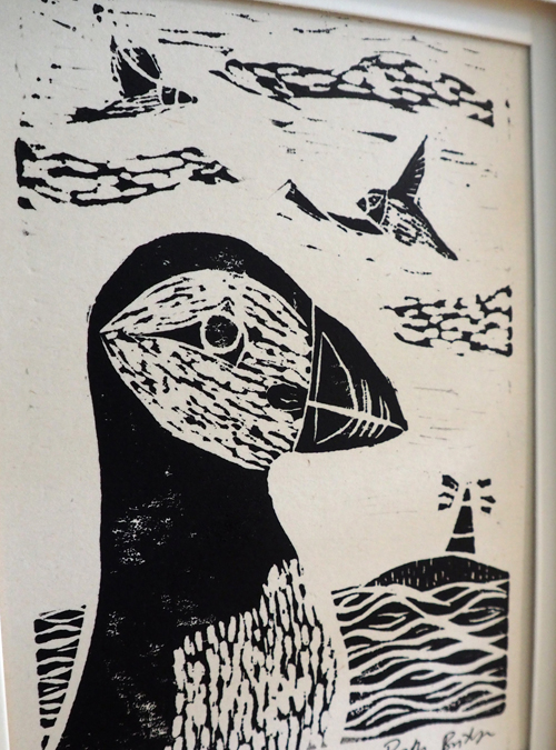 close up of puffin lino print
