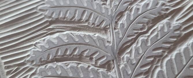 lino carving of a fern