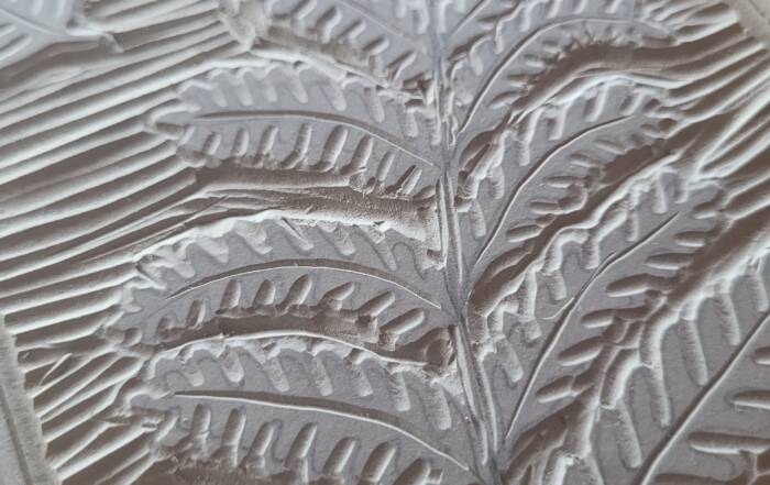 lino carving of a fern