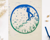 Stepping into the sea. A lino print of someone stepping into the sea/marine lake