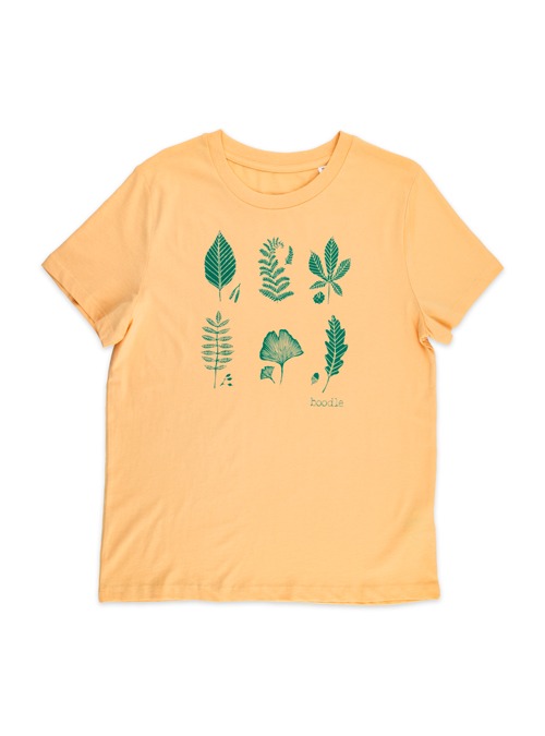 Light orange womens T-shirt featuring 6 leaves printed in green ink. Birch leaf, Fern, Horseshoe, Rowan, Gingkp and oak