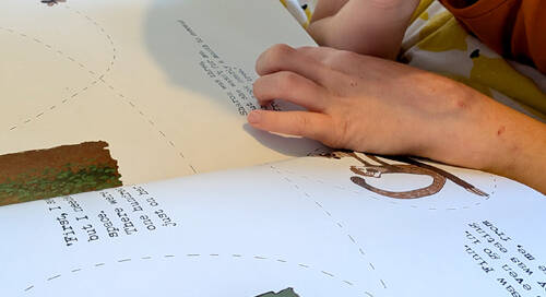 kid reading sloth moth book