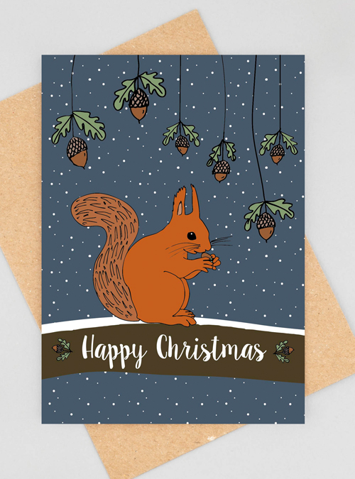Red Squirrel christmas card on top of a brown Kraft envelope